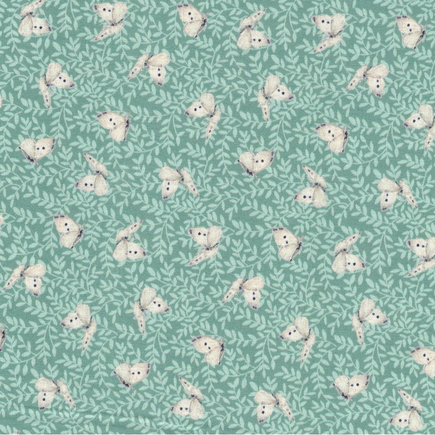 tissu coton vert d'eau motif papillons