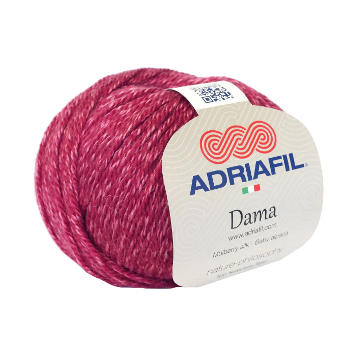 Pelote Dama Adriafil coloris 58 fuchsia intense, laine lumineuse pour créations modernes et colorées, disponible chez Mille et Un Tissus à Moulins.