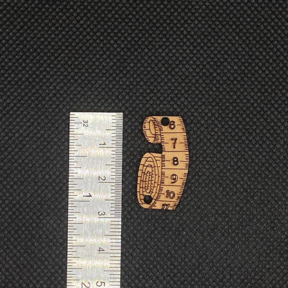 Bouton bois mètre ruban