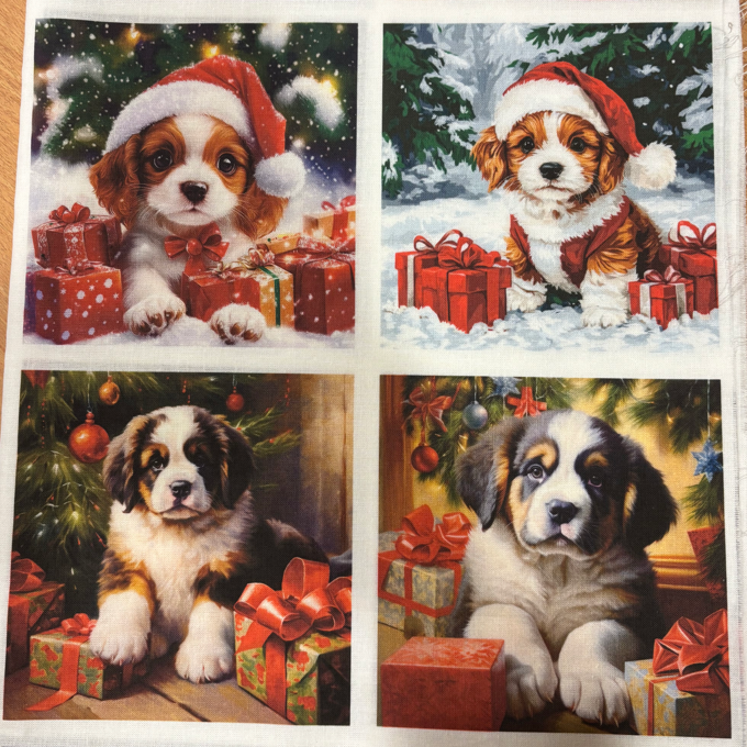 Panneau de tissu en coton composé de 4 carrés illustrant des chiens de Noël avec un style hivernal, disponible chez Mille et Un Tissus à Moulins.