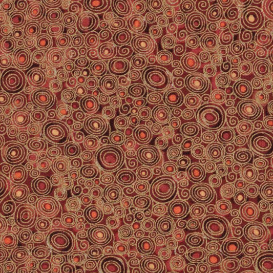 Tissu coton patchwork motifs tourbillons stylisés orange et brun, idéal pour accessoires d'automne, disponible chez Mille et Un Tissus à Moulins.