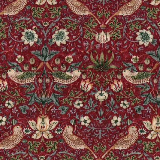 Tissu patchwork délicat avec motifs oiseaux et fleurs sur fond rouge sombre, pour sacs élégants, disponible chez Mille et Un Tissus à Moulins.