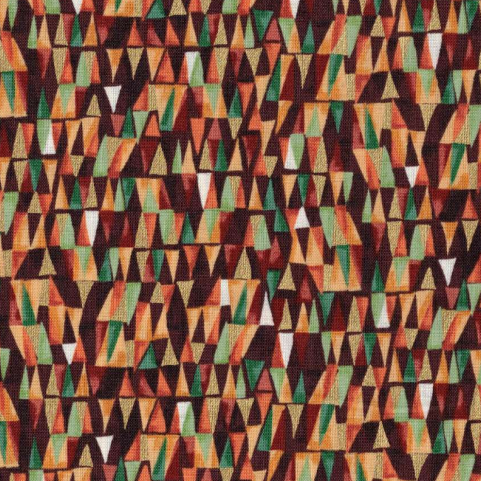 Tissu patchwork imprimé petits triangles multicolores tons automnaux, pour un rendu graphique moderne, disponible chez Mille et Un Tissus à Moulins.