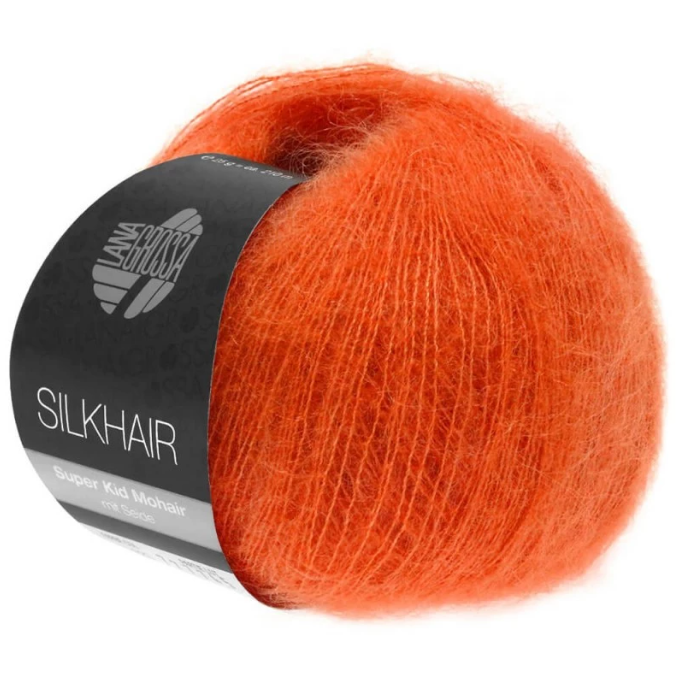 Pelote de laine mohair unie Silkhair Lana Grossa coloris 136 orange vif, fil fin et soyeux de haute qualité, disponible chez Mille et Un Tissus à Moulins.