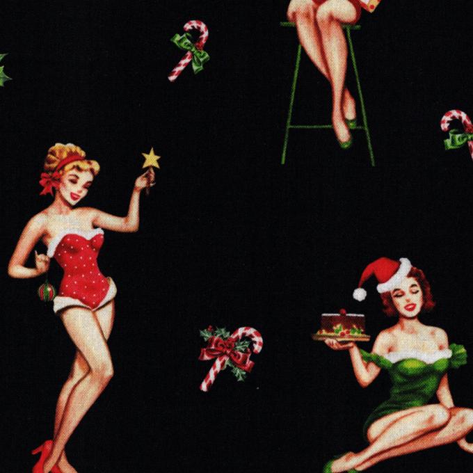 Tissu patchwork noir aux motifs rétro de personnages de Noël vintage, idéal pour des créations de fêtes originales, disponible chez Mille et Un Tissus à Moulins.