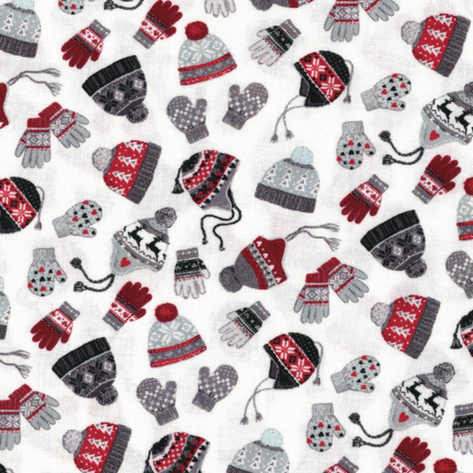 Tissu blanc aux motifs de petites moufles d'hiver colorées, idéal pour des accessoires de saison doux, disponible chez Mille et Un Tissus à Moulins.