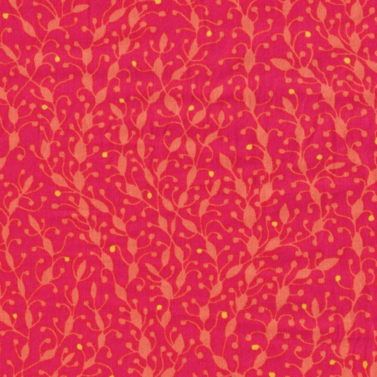 Tissu coton rouge framboise avec délicats motifs de feuillage dorés, idéal pour la confection d'accessoires élégants, disponible chez Mille et Un Tissus à Moulins.